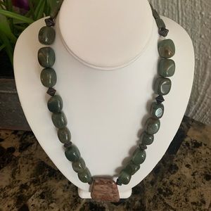 Handmade jade necklace with pendant.